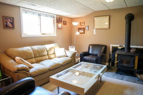43081 Rng Rd 95A, Hardisty, AB - Indoor Photo Showing Living Room With Fireplace