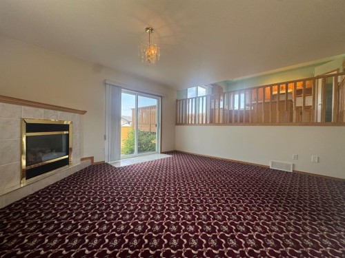 114 Sunridge Avenue, Blackfalds, AB - Indoor With Fireplace