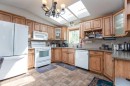337-37543 England Way, Rural Red Deer County, AB  - Indoor Photo Showing Kitchen 