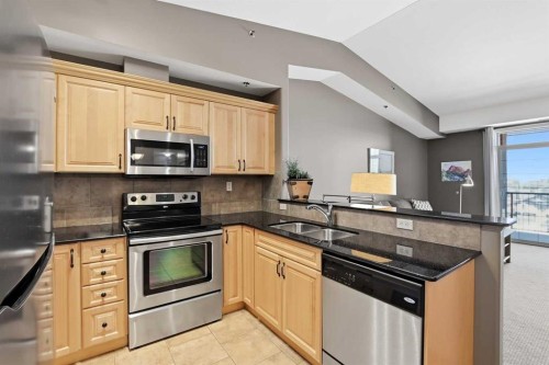412-69 Ironstone Drive, Red Deer, AB - Indoor Photo Showing Kitchen With Stainless Steel Kitchen With Double Sink