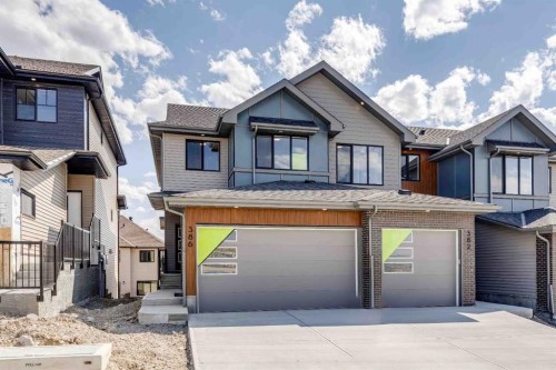386 Heritage Boulevard, Cochrane, AB - Outdoor With Facade