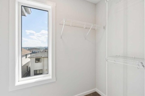 386 Heritage Boulevard, Cochrane, AB - Indoor With Storage