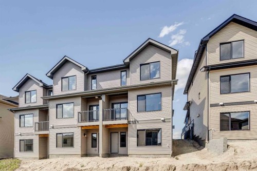 386 Heritage Boulevard, Cochrane, AB - Outdoor With Facade