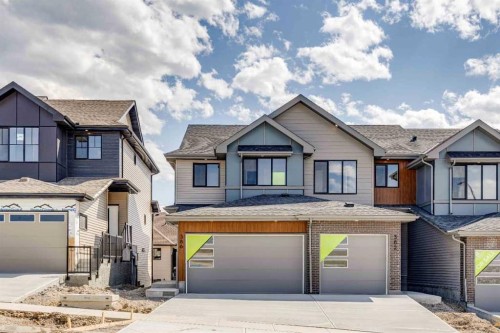 386 Heritage Boulevard, Cochrane, AB - Outdoor With Facade