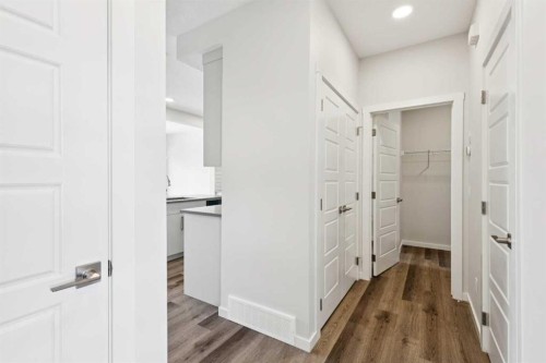 386 Heritage Boulevard, Cochrane, AB - Indoor Photo Showing Other Room