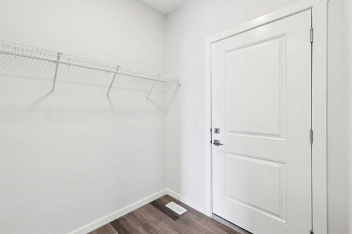 386 Heritage Boulevard, Cochrane, AB - Indoor With Storage