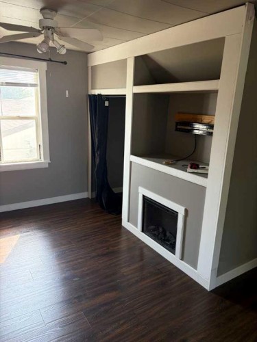5206 49 Street, Castor, AB - Indoor Photo Showing Other Room With Fireplace
