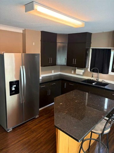 5206 49 Street, Castor, AB - Indoor Photo Showing Kitchen With Double Sink