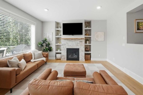 110 Longmire Close, Red Deer, AB - Indoor Photo Showing Living Room With Fireplace