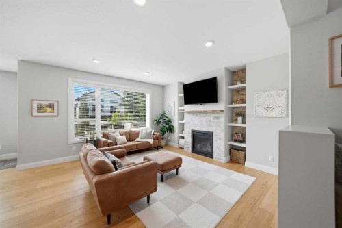 110 Longmire Close, Red Deer, AB - Indoor Photo Showing Living Room With Fireplace