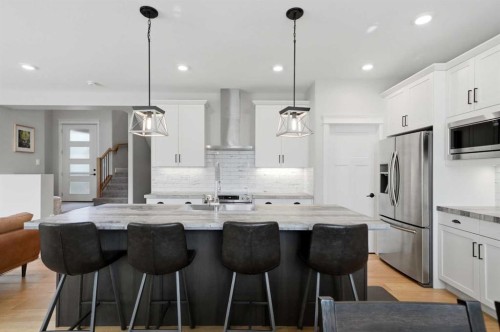 110 Longmire Close, Red Deer, AB - Indoor Photo Showing Kitchen With Stainless Steel Kitchen With Double Sink With Upgraded Kitchen