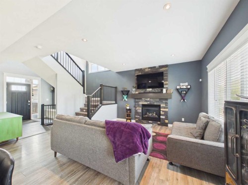 45 Alderwood Close, Blackfalds, AB - Indoor Photo Showing Living Room With Fireplace