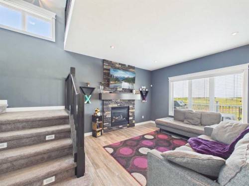 45 Alderwood Close, Blackfalds, AB - Indoor Photo Showing Living Room With Fireplace