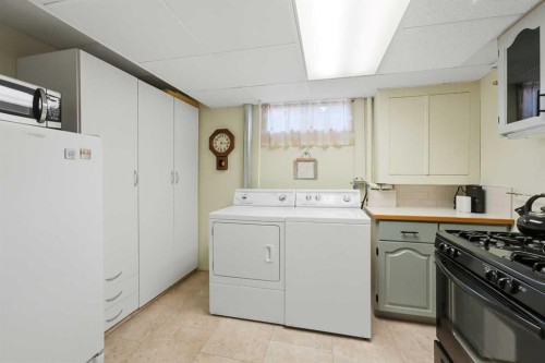 37 Wildrose Street, Rural Lacombe County, AB - Indoor Photo Showing Laundry Room