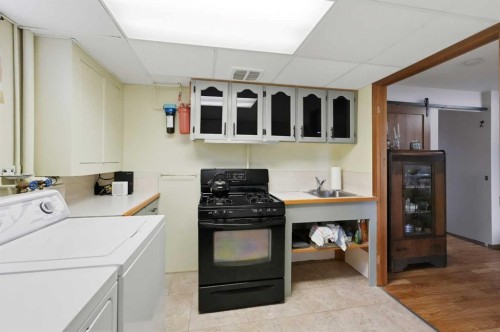 37 Wildrose Street, Rural Lacombe County, AB - Indoor Photo Showing Laundry Room