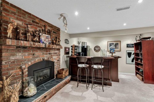 9111 Fairmount Drive Se, Calgary, AB - Indoor With Fireplace