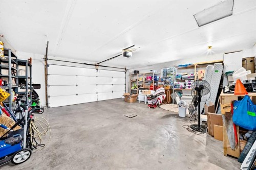 94 Hathaway Lane, Lacombe, AB - Indoor Photo Showing Garage
