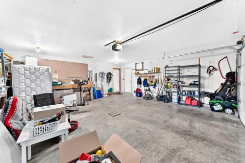 94 Hathaway Lane, Lacombe, AB - Indoor Photo Showing Garage