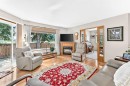 37-2821 Botterill Crescent, Red Deer, AB  - Indoor Photo Showing Living Room With Fireplace 