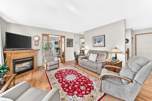 37-2821 Botterill Crescent, Red Deer, AB - Indoor Photo Showing Living Room With Fireplace