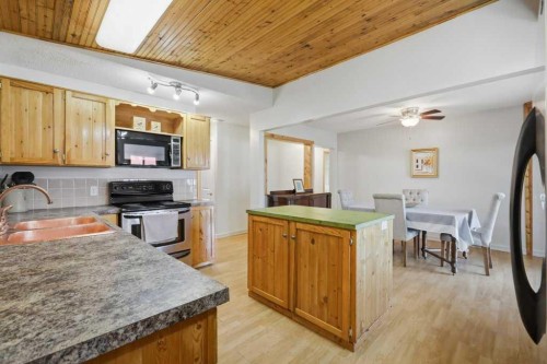 5127 50 A Avenue, Sylvan Lake, AB - Indoor Photo Showing Kitchen With Double Sink