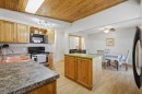 5127 50 A Avenue, Sylvan Lake, AB  - Indoor Photo Showing Kitchen With Double Sink 