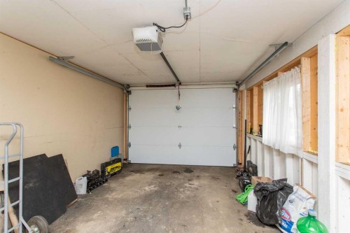 12 Valley Crescent, Lacombe, AB - Indoor Photo Showing Garage