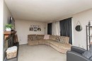 10 Valley Crescent, Lacombe, AB  - Indoor Photo Showing Living Room With Fireplace 