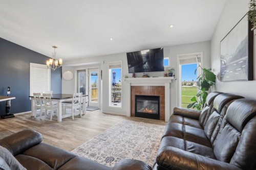 70 Rozier Close, Sylvan Lake, AB - Indoor Photo Showing Living Room With Fireplace
