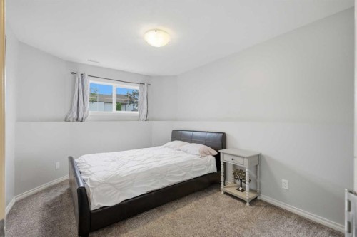 70 Rozier Close, Sylvan Lake, AB - Indoor Photo Showing Bedroom