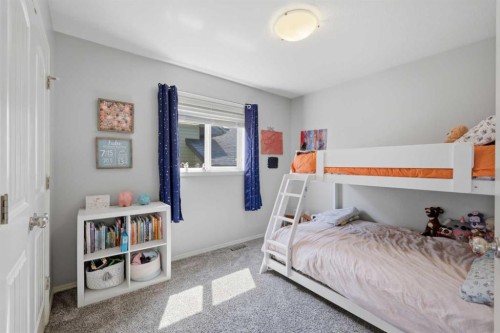 70 Rozier Close, Sylvan Lake, AB - Indoor Photo Showing Bedroom