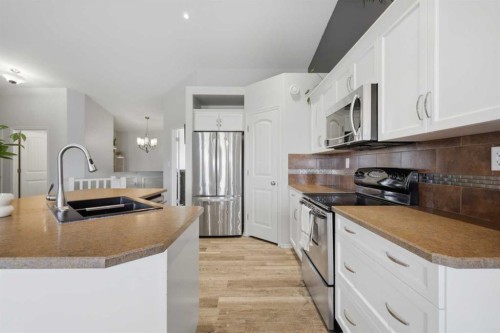 70 Rozier Close, Sylvan Lake, AB - Indoor Photo Showing Kitchen With Double Sink