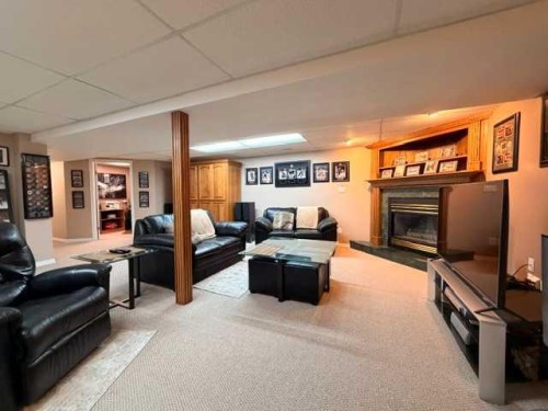 402 East Puffin Street, Pelican Point, AB - Indoor With Fireplace