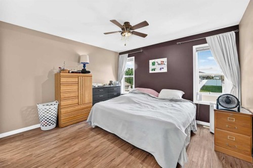 59 Lodge Place, Sylvan Lake, AB - Indoor Photo Showing Bedroom