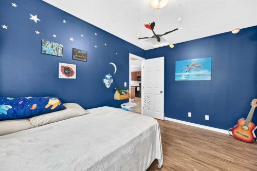 59 Lodge Place, Sylvan Lake, AB - Indoor Photo Showing Bedroom