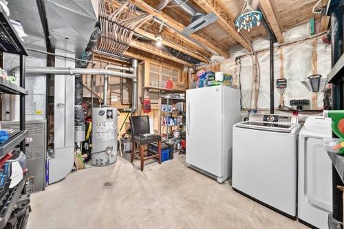 59 Lodge Place, Sylvan Lake, AB - Indoor Photo Showing Laundry Room