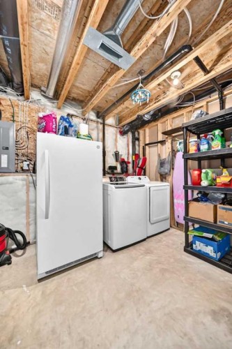 59 Lodge Place, Sylvan Lake, AB - Indoor Photo Showing Laundry Room