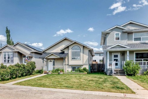 59 Lodge Place, Sylvan Lake, AB - Outdoor With Facade