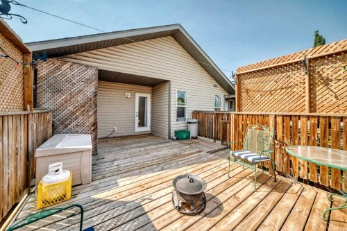 59 Lodge Place, Sylvan Lake, AB - Outdoor With Deck Patio Veranda With Exterior
