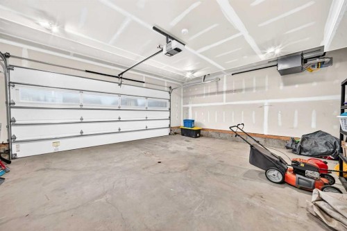 38 Cambridge Close, Blackfalds, AB - Indoor Photo Showing Garage