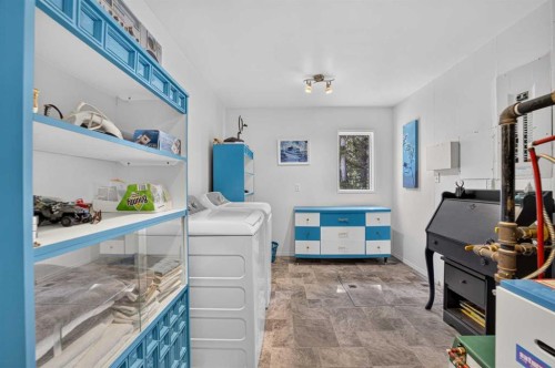 7-32579 Range Road 52, Rural Mountain View County, AB - Indoor Photo Showing Laundry Room