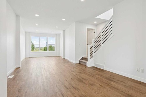 49 Silverton Glen Way Sw, Calgary, AB - Indoor Photo Showing Other Room