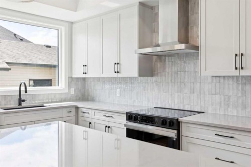 49 Silverton Glen Way Sw, Calgary, AB - Indoor Photo Showing Kitchen With Upgraded Kitchen