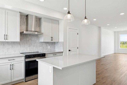 49 Silverton Glen Way Sw, Calgary, AB - Indoor Photo Showing Kitchen With Upgraded Kitchen