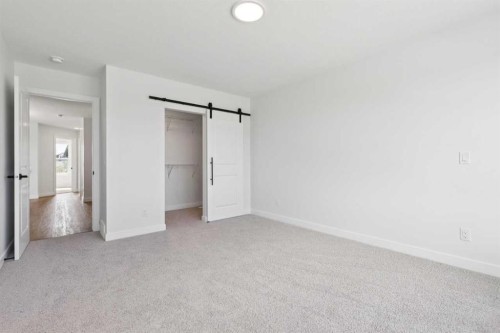 49 Silverton Glen Way Sw, Calgary, AB - Indoor Photo Showing Other Room