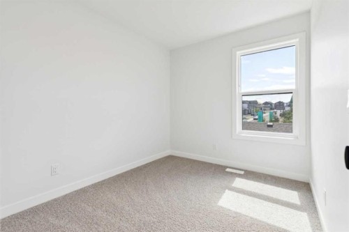 49 Silverton Glen Way Sw, Calgary, AB - Indoor Photo Showing Other Room