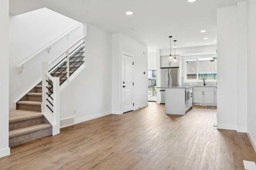 49 Silverton Glen Way Sw, Calgary, AB - Indoor Photo Showing Kitchen With Upgraded Kitchen