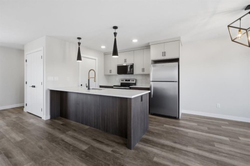 20 Toye Street, Red Deer, AB - Indoor Photo Showing Kitchen With Stainless Steel Kitchen With Upgraded Kitchen