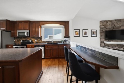 57 Page Avenue, Red Deer, AB - Indoor Photo Showing Kitchen With Stainless Steel Kitchen
