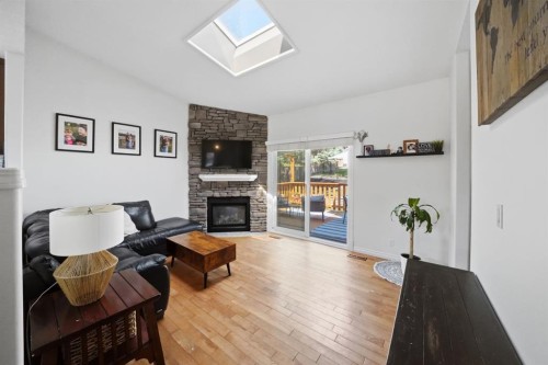 57 Page Avenue, Red Deer, AB - Indoor With Fireplace